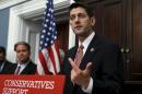 House Ways and Means Chairman Paul Ryan (R-WI) gestures at a news conference