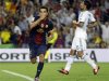 Barcelona's Xavi celebrates after scoring a goal against Real Madrid during their Spanish Super Cup first leg soccer match in Barcelona