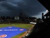 Storm clouds move over Wrigley Field delaying the start of a baseball game between the Pittsburgh Pirates and Chicago Cubs, Monday, Sept. 17, 2012, in Chicago. (AP Photo/Jim Prisching)