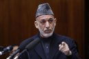 Afghanistan's President Karzai speaks during opening ceremony of the Afghanistan parliament in Kabul