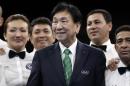 AIBA President Dr. Ching-Kuo Wu poses for picture with referees in the ring after the final matches at the 2016 Summer Olympics in Rio de Janeiro, Brazil, Sunday, Aug. 21, 2016. (AP Photo/Frank Franklin II)