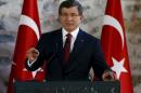 Turkish Prime Minister Davutoglu speaks during a joint news conference with U.S. Vice President Biden in Istanbul, Turkey