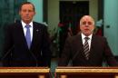Picture released by Iraq's Prime Minister's office shows Iraqi Prime Minister Haider al-Abadi (R) and his Australian counterpart Tony Abbott taking part in a press conference in Baghdad on January 4, 2015