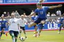 United States' Julie Johnston (19) shoots on goal as Ireland's Fiona O'Sullivan (20) defends during the first half of an exhibition soccer match Sunday, May 10, 2015, in San Jose, Calif. (AP Photo/Tony Avelar)