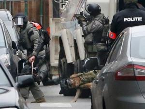 Police at the scene of a security operation in the Brussels suburb of Molenbeek in Brussels, Belgium.