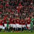 Manchester United players celebrate during the English Premier League trophy presentation ceremony at Old Trafford stadium in Manchester