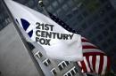The flag of the Twenty-First Century Fox Inc is seen waving at the company headquarters in the Manhattan borough in New York