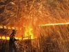 A labourer works at a steel factory in Dalian