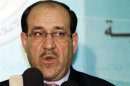 Iraq's Prime Minister Nuri al-Maliki speaks during a joint news conference with Iraqi parliament speaker Osama al-Nujaifi in Baghdad