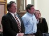 Former University of Montana quarterback, Jordan Johnson, center, reacts to being acquitted of rape charges during his trial Friday March 1, 2013 in Missoula, Mont. With Johnson are his attorneys, David Paoli and Kirsten Pabst. The accusations against Johnson, 20, have drawn much attention in Montana, where UM football is the top sports attraction. Jurors deliberated for less than two hours. (AP Photo/Matt Gouras)