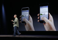 <p>               Phil Schiller, Apple's senior vice president of worldwide marketing, speaks on stage during an introduction of the new iPhone 5 at an Apple event in San Francisco, Wednesday Sept. 12, 2012. (AP Photo/Eric Risberg)