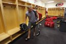 Carolina Hurricanes' Jordan Staal leaves the locker room after the NHL hockey team's informal workout at Raleigh Center Ice on Friday, Sept. 14, 2012, in Raleigh, N.C. Staal was taking his gear, which is normally stored in the lockers, with him as the players will not be allowed to use the facility in the event of an NHL lockout. (AP Photo/The News & Observer, Ethan Hyman) MANDATORY CREDIT