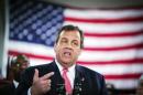 New Jersey Governor Chris Christie gestures as he speaks to media and homeowners about the ongoing recovery from Hurricane Sandy in Manahawkin, New Jersey