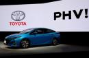 Toyota Motor Corp. displays the company's Prius PHV Plug-in-Hybrid vehicle during an event to mark the launch of the car in Japan, in Tokyo