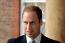 Britain's Prince William, holds his son Prince George as they arrive at Chapel Royal in St James's Palace in London, for the christening of the three month-old Prince Wednesday Oct. 23, 2013. (AP Photo/John Stillwell/Pool)