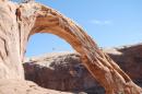 FILE - This Nov. 4, 2012, file photo, shows an unidentified person swinging from the Corona Arch near Moab, Utah. The federal government is asking for people to weigh in on whether it should temporarily ban daredevil rope swinging and other activities from iconic arches in Moab. The Bureau of Land Management says rope recreation at Corona Arch and Gemini Bridges may be disturbing other people in popular hiking areas that each get more than 40,000 visitors a year. The BLM is accepting written and emailed comments through Sept. 25, 2014. (AP Photo/The Salt Lake Tribune, Brian Maffly) DESERET NEWS OUT; LOCAL TV OUT; MAGS OUT