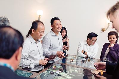 Guests interacting with Asia's first tactile multi-touch table