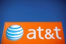 Time Warner, AT&T shares fall with concerns over deal clearance