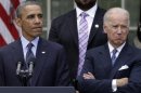 U.S. President Barack Obama speaks next to Vice President Joe Biden on commonsense measures to reduce gun violence, in Washington