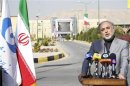 Chief of Iran's Atomic Energy Organization Salehi makes a speech during ceremony to take delivery of locally produced yellowcake at the UCF plant in Isfahan