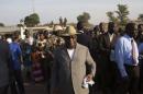 Mali's President Ibrahim Boubacar Keita checks on measures preventing the spread of Ebola in Kouremale