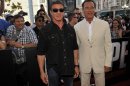 Sylvester Stallone, left, and Arnold Schwarzenegger arrive at the "Escape Plan" special screening on Day 2 of Comic-Con International on Thursday, July 18, 2013 in San Diego, Calif. (Photo by Chris Pizzello/Invision/AP)