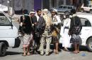 Yemeni tribal gunmen from the Popular Resistance Committees loyal to fugitive President Abedrabbo Mansour Hadi gather on a street in the southern city of Taez during ongoing clashes with Shiite Huthi rebels on May 6, 2015
