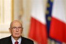 Italian President Giorgio Napolitano attends a joint news conference at the Elysee Palace in Paris