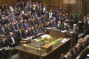 In this image taken from video, Britain's Prime Minister David Cameron, front left, stands to speak to the assembled parliament during a debate on Syria, in Britain's parliament, London, Thursday Aug. 29, 2013. Britain's leaders said Thursday it would be legal under humanitarian doctrine to launch a military strike against Syria even without authorization from the United Nations Security Council, but it is not certain how much support there is for the government's resolution on Syria. (AP Photo / PA) UNITED KINGDOM OUT - NO SALES - NO ARCHIVES