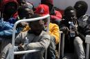 Migrants arrive at Palermo's harbor, Italy, after being rescued at sea, Wednesday, April 15, 2015. The U.N. refugee agency says the shipwreck in the Mediterranean this week, in which 400 migrants are presumed to have died, is among the deadliest single incidents in the last decade. The tragedy comes amid an unprecedented wave of migration toward Europe from Africa and the Middle East. UNHCR Italy spokeswoman Barbara Molinario says 900 migrants have died or gone missing at sea so far this year, part of a phenomenon the agency has been tracking since 2011. (AP Photo/Alessandro Fucarini)