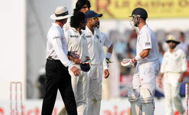 Virat Kohli and Jonathan Trott exchange a few words on Day 4 of the fourth cricket Test between India and England at the Jamtha Stadium in Nagpur, Sunday, December 16, 2012. (c) BCCI