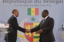 U.S. President Obama and Senegal President Sall shake hands after their joint news conference at the Presidential Palace in Dakar
