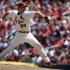 St. Louis Cardinals starting pitcher Adam Wainwright throws during the fourth inning of a baseball game against the Colorado Rockies Saturday, May 11, 2013, in St. Louis. (AP Photo/Jeff Roberson)