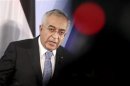 Palestinian Prime Minister Fayyad addresses news conference after talks in Berlin