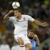 England's Carroll heads the ball as Italy's Nocerino looks on on during their Euro 2012 quarter-final soccer match at the Olympic Stadium in Kiev