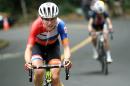 Annemiek van Vleuten, of the Netherlands, leads Mara Abbott, of the United States, during the women's cycling road race at the 2016 Summer Olympics in Rio de Janeiro, Brazil, Sunday, Aug. 7, 2016. (Bryn Lennon/Pool Photo via AP)