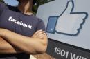 a Facebook worker waits for friends in Menlo Park, Calif