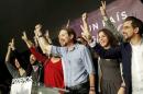 Podemos (We Can) party leader Pablo Iglesias reacts with party members after results were announced in Spain's general election in Madrid