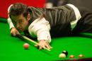 Ronnie O'Sullivan of England plays a shot during the World Snooker Championship 2014 final on May 5, 2014