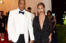 FILE - This May 5, 2014 file photo shows Jay Z, left, and Beyonce at The Metropolitan Museum of Art's Costume Institute benefit gala celebrating "Charles James: Beyond Fashion" in New York. Beyonce, Jay Z and Solange say they have worked through and are moving on since a video leaked this week of Solange attacking Jay Z in an elevator inside the Standard Hotel after the May 5, gala. (Photo by Evan Agostini/Invision/AP, File)