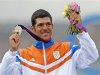 Silver medallist Cyprus' Pavlos Kontides waves during the men's Laser class sailing competition victory ceremony at the London 2012 Olympic Games