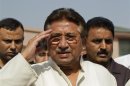 Pakistan's former President Musharraf salutes as he arrives to unveil his party manifesto for the forthcoming general election at his residence in Islamabad
