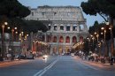 An empty Fori Imperiali street in front of ancient Colosseum is seen in Rome