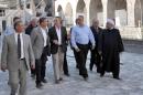 A delegation of French members of parliament from the Franco-Syrian friendship group being accompanied by the governor of Homs Talal al-Barazi (2R) visit the damaged Grand Al-Nuri mosque in the old part of the central Syrian city of Homs