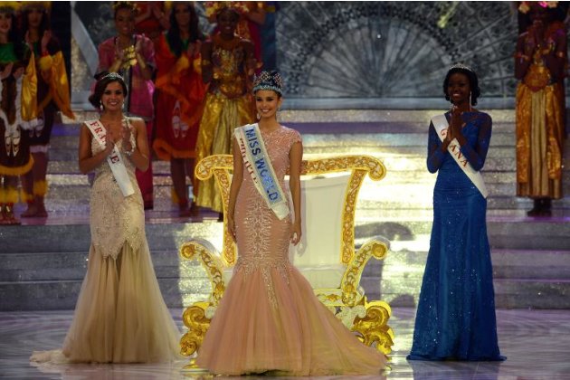 The new Miss World, Megan Young (C), from the Philippines stands after winning the crown during the Miss World 2013 finals in Nusa Dua, on Indonesia's resort island of Bali on September 28, 2013
