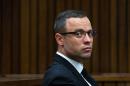 Oscar Pistorius looking on during his trial at the high court in Pretoria on May 13, 2014