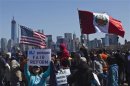 People take part in a rally to demand that Congress fix the broken immigration system at Liberty State Park in Jersey City, New Jersey
