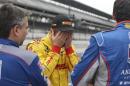 Ryan Hunter-Reay reacts after watching the wreck of James Hinchcliffe, of Canada, during practice for the Indianapolis 500 auto race at Indianapolis Motor Speedway in Indianapolis, Monday, May 18, 2015. (AP Photo/Darron Cummings)