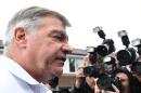 Former England football manager Sam Allardyce speaks to the press outside his home in Bolton on September 28, 2016