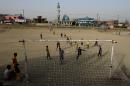 Afghan youths play football at a field in the outskirts of Kabul in September. Japan's 2018 World Cup qualifiers against the country and also Syria will be played on neutral ground due to security concerns